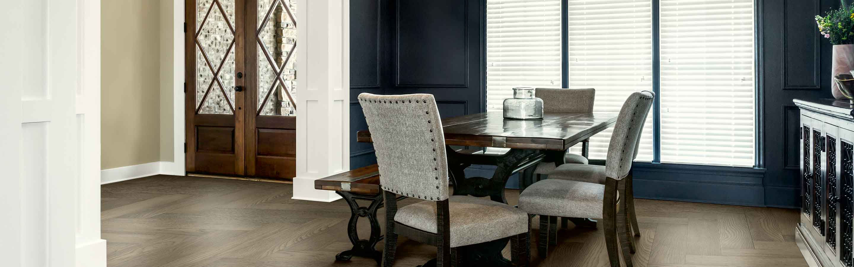 blinds on large windows in a dining room