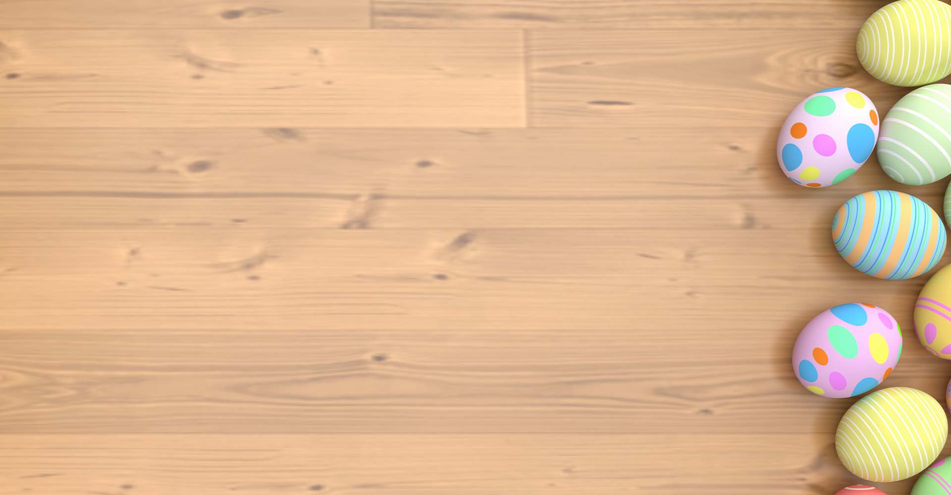 Dad pushing Daughter in Cardboard Box on Hardwood Floors