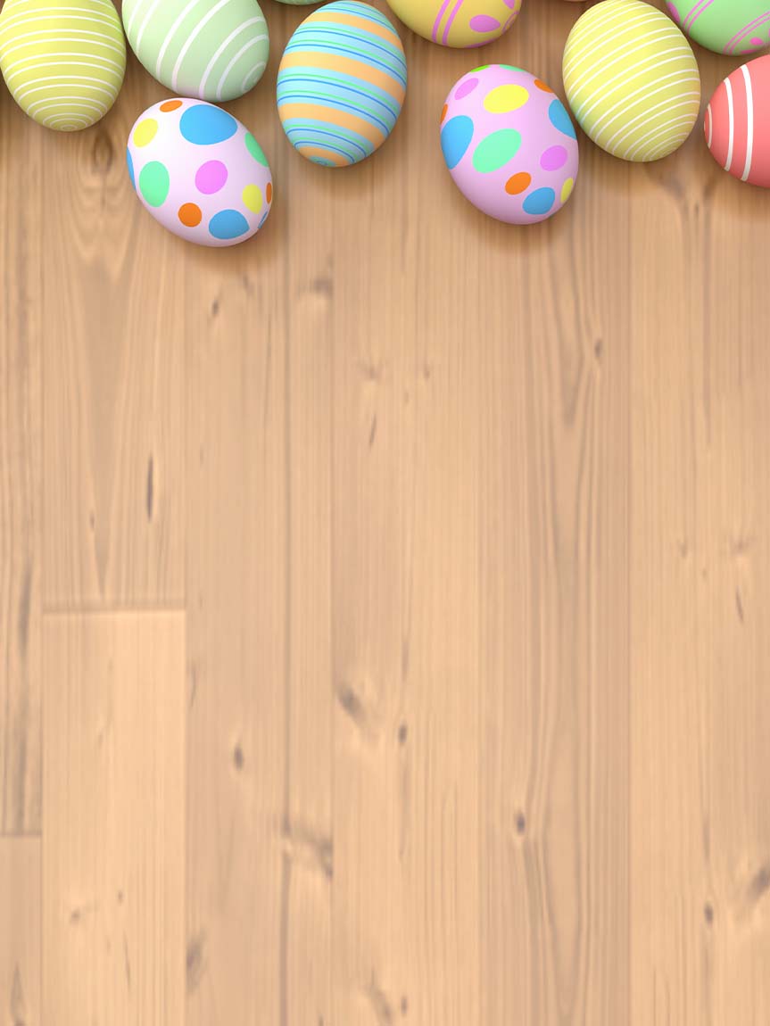 Dad pushing Daughter in Cardboard Box on Hardwood Floors